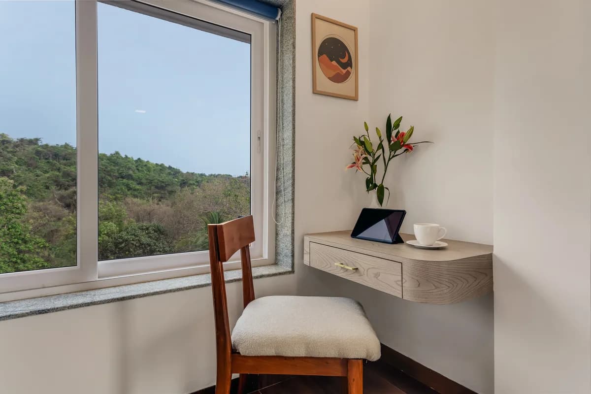 Private workspace with window view at Nivaãra Nerul